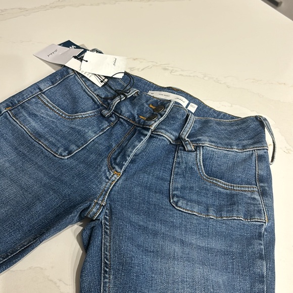 Subdued Low Waist Flare Jean With Front Square Pockets - Picture 13 of 13